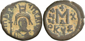 Maurice Tiberius, 582-602. Follis (Bronze, 28 mm, 9.93 g, 1 h), Cyzicus, RY 10 = AD 591/2. O N mA૪RC TibЄRI P P [AVG] Helmeted and cuirassed bust of M...