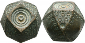 ISLAMIC. Circa 10-13th centuries. Weight of 50 Dirhams (Bronze, 25x31x31 mm, 146.75 g), a coin weight in the form of a polyhedron. All faces covered w...