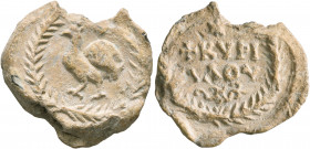 Kyrillos, circa 7th-8th centuries. Seal (Lead, 22 mm, 7.24 g, 12 h). Peacock advancing left, all within wreath. Rev. +KVPI/ΛΛOV in two lines, star abo...