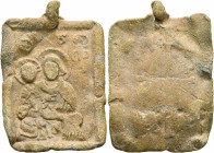 Uncertain, 10th-12th century. Pendant (Lead, 29x37 mm, 13.49 g). ...૪ Ⲱ / ΠO The Mother of God nimbate, wearing chiton and maphorion, pointing with he...