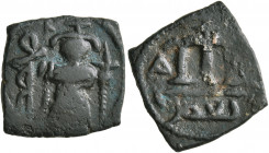 ISLAMIC, Umayyad Caliphate. temp. Mu'awiya I ibn Abi Sufyan, AH 41-60 / AD 661-680. Fals (Bronze, 15x16 mm, 2.90 g, 4 h), Arab-Byzantine type, uncerta...