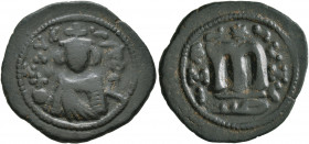 ISLAMIC, Umayyad Caliphate. temp. Mu'awiya I ibn Abi Sufyan, AH 41-60 / AD 661-680. Fals (Bronze, 23 mm, 4.00 g, 7 h), Arab-Byzantine type, Hims. Impe...