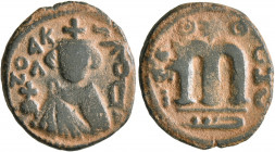 ISLAMIC, Umayyad Caliphate. temp. Mu'awiya I ibn Abi Sufyan, AH 41-60 / AD 661-680. Fals (Bronze, 19 mm, 3.35 g, 7 h), Arab-Byzantine type, Hims. Impe...