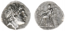 The Seleukid Kingdom - Antiochos II (261-246 BC) - AR Drachm (Magnesia on the Maiandros, 4.06 g) - Diademed head right / Apollo Delphios seated left o...