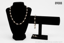 Halskette (L 45 cm), Armband (L 23 cm) und 2 Ohrstecker, Fa. Arpas, 14 Karat (585er Gold), Gelb- und Weißgold, 36,88 g Gesamtgewicht