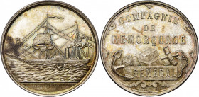 FRANCE, AR jeton, s.d. (1860-1880), Esparon. Compagnie de remorquage du Sénégal. D/ Un remonavire à aube naviguant à g. R/ Une ancre, une caisse et un...