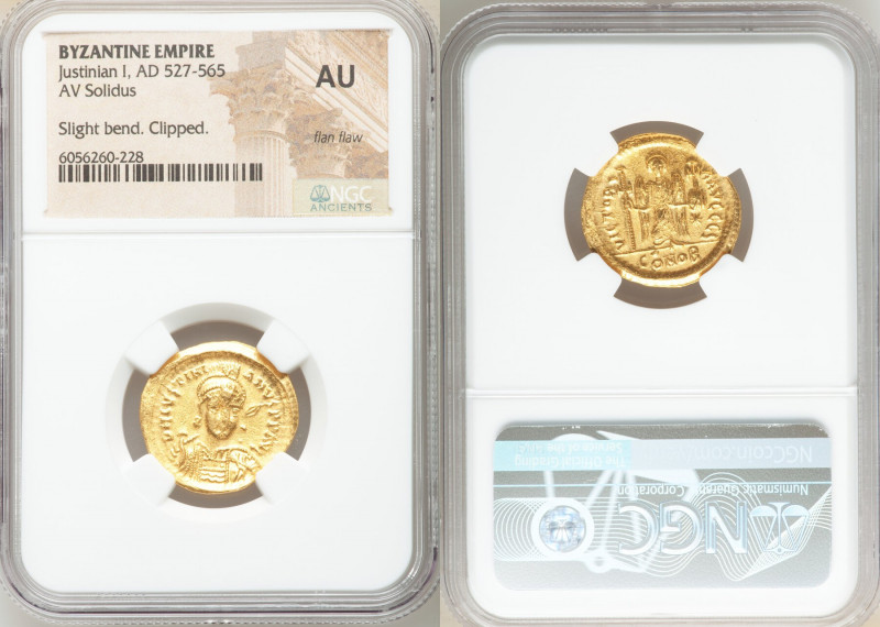 Justinian I the Great (AD 527-565). AV solidus (20mm, 6h). NGC AU, flan flaw, sl...