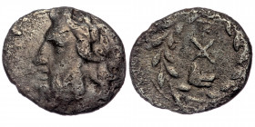 Achaea, Achaean League AR Triobol. Argos, circa 195-188 BC. 
Laureate head of Zeus left 
Rev: Achaean League monogram; below, head of wolf right; all ...