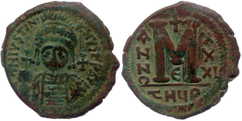 Justinian I (527-565) AE32 Follis Theoupolis (Antioch), 5rd officina. Dated RY 3...