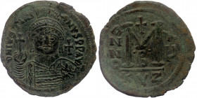 JUSTINIAN I (527-565) AE40 Follis, Cyzicus, dated RY 15 (541/2)
D N IVSTINIANVS P P AVG - diademed, helmeted, and cuirassed facing bust, holding globu...