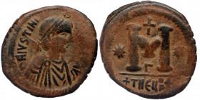 Justinian I. 527-565. AE Follis. Theoupolis (Antioch) mint. Struck 533-537. 
Diademed and draped bust right 
Rev: Large M; cross above, stars flanking...