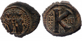 Justin II and Sophia AD 565-578. Dated RY 5=AD 569/0.. Theoupolis (Antioch) Half follis AE
Justin, on left, and Sophia, on right, seated facing on a d...
