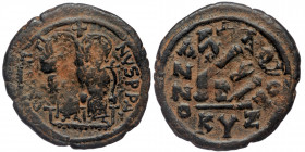 Justin II. 565-578. AE follis (32.41 mm, 14.62 g, 6 h). Cyzicus mint, Over struck
Justin on left, Sophia on right, seated facing on double-throne, bot...