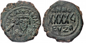 Phocas (602-610) AE Follis Cyzicus, RY 5 = 606/7. 
δ N FOCAS PERP Ao - Crowned bust of Phocas facing, wearing consular robes, holding mappa in his rig...