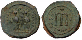 PHOCAS (602-610) AE32 Follis, RY 1 = 602-603. 
d M FOCA E- P P AVC - Phocas and Leontia standing facing, the Emperor holding globus cruciger , the Emp...