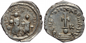 Heraclius, with Heraclius Constantine. AD 610-641. Constantinople. Hexagram AR
Heraclius on left and Heraclius Constantine on right, seated facing on ...