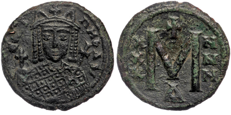 IRENE (797-802). Follis. Constantinople. AE
ЄIRINH ЬAS./ Crowned facing bust, ho...