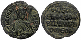 Leo VI the Wise (886-912) AE26 Follis, Constantinople mint. 
+ LЄOҺ ЬASILEVS ROM ✷ - Crowned and draped bust facing, holding akakia 
Rev: +LЄOҺ/ЄҺ ӨЄO...