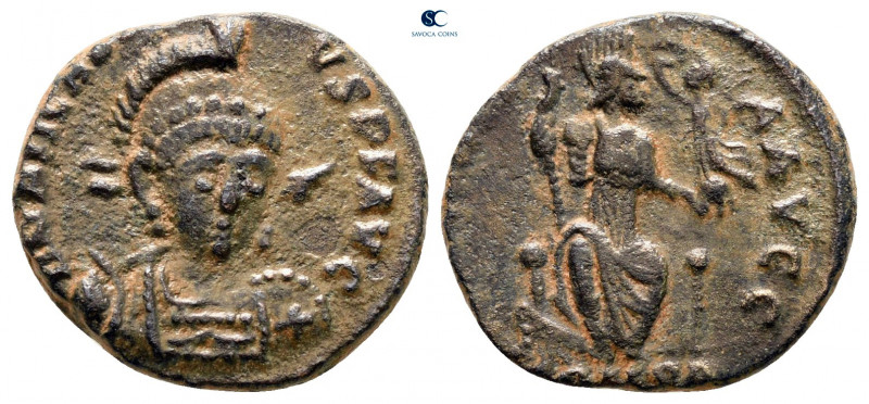 Arcadius AD 383-408. Constantinople
Follis Æ

16 mm, 2,45 g



very fine