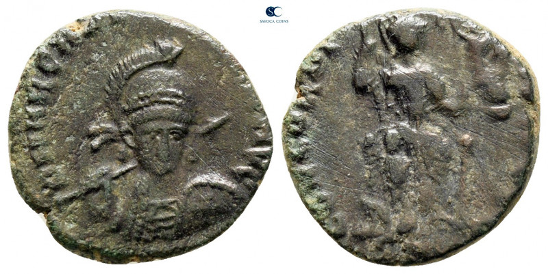 Arcadius AD 383-408. Uncertain mint
Follis Æ

16 mm, 2,62 g



nearly ver...