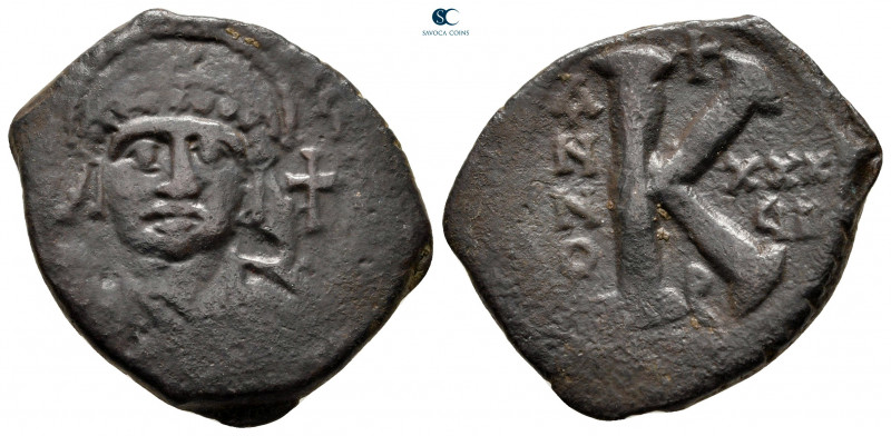 Justinian I AD 527-565. Theoupolis (Antioch)
Half Follis or 20 Nummi Æ

25 mm...