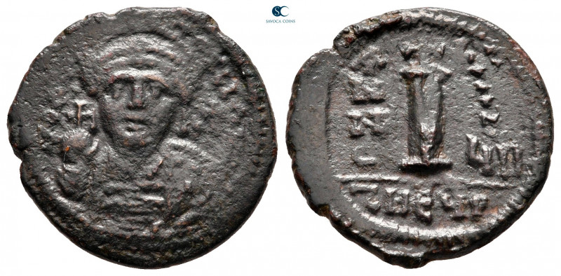 Justinian I AD 527-565. Theoupolis (Antioch)
Decanummium Æ

20 mm, 3,74 g

...