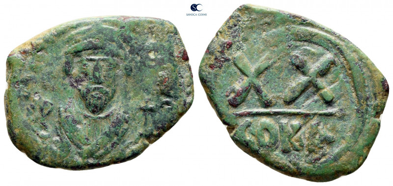 Phocas AD 602-610. Constantinople
Half Follis or 20 Nummi Æ

24 mm, 4,96 g
...