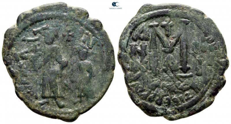 Heraclius with Heraclius Constantine AD 610-641. Constantinople
Follis or 40 Nu...