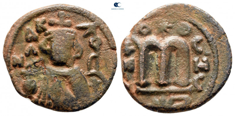 Time of 'Abd al-Malik ibn Marwan AH 65-86. Hims (Emesa) mint
Fals Æ

20 mm, 3...