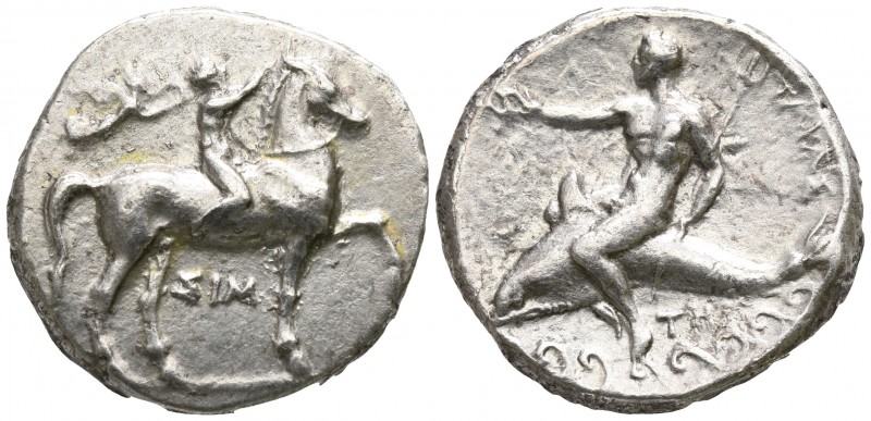 Calabria. Tarentum 330-300 BC.
Nomos AR

20mm., 7,79g.

Horse stepping righ...