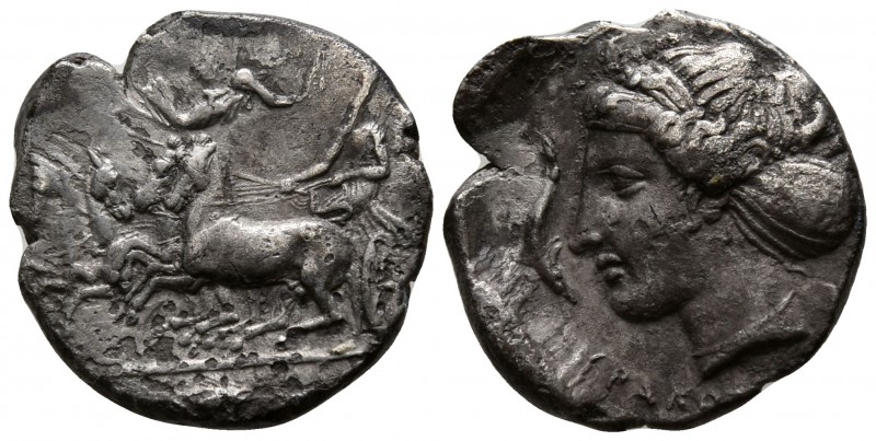 Sicily. Syracuse circa 410-400 BC.
Hemidrachm AR

13mm., 2,06g.

Charioteer...
