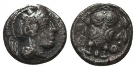 Attica, Athens. AR Hemidrachm, c. 454-404 BC.
Obv. Helmeted head of Athena right, with frontal eye.
Rev. A - Θ - Ǝ, Owl standing facing between two ...