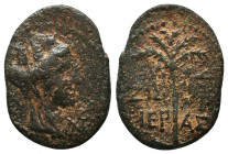 Phoenicia, Tyre. Civic Issue. Second century A.D. AE struck A.D. 91/2. Turreted and veiled head of Tyche right, palm before / IEPAΣ; ZIΣ and TYP monog...