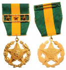 BRAZIL
Military Long Service Medal, instituted in 1901, For 10 Years of Service
Breast Badge, gilt Bronze, 33 mm, original suspension ring and ribbo...
