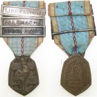 FRANCE
1939-45, War Commemorative Medal
Breast Badge, 40x28 mm, Bronze, ribbon bars "Liberation, Allemagne, Defense Passive" original suspension rin...