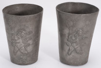 FRANCE
Pair of tin tumblers
Conical shape, Cupid subject engraved in relief on the body. Height 9 cm. Work old in the nineteenth, probably France. ...