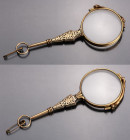 FRANCE
Pair of folding theater glasses 
Nice pair of folding theater glasses in gold-plated metal, model with openwork branch. Fine carving, a very ...