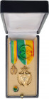 GABON
NATIONAL ORDER OF MERIT
Officer's Cross, instituted in 1971. Breast Badge, 47x32 mm, gilt Bronze, both sides enameled, original suspension rin...