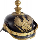 GERMANY - PREUSSEN
Prussian Officer Field Artillery Pickelhaube, md 1871-1899. 
Black leather with brass gilted ornaments. Round front visor and bal...