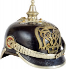 GERMANY - PREUSSEN
WW1 Imperial German Berlin Police Pickelhaube, 1900-1918.
Black leather with brass silvered ornaments. Round front visor, crucifo...