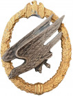 GERMANY- 3RD REICH
Paratrooper Badge
Breast Badge, 57x43 mm, gilt Zinc, superimposed part silvered metal, maker`s mark on the back, svastica missing...