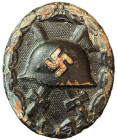 GERMANY- 3RD REICH
Wounded Badge
Black Grade. Breast Bagde, 44x37 mm, blackened metal, vertical pin on the back. I- 
Estimate: EUR 150 - 300