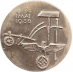 GERMANY- 3RD REICH
1st of May Labor Day 1936
Breast Badge, 35 mm, Aluminium, maker`s mark "FR.ZIMMERMANN STUTTGART", horizontal pin on the back. I ...