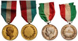 ITALY
Group of 2 Medals of Merit Victor Emmanuel III 
Breast Badges, gilt bronze, silver, 38 mm, original suspension rings and ribbons. (2) I 
Esti...