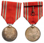 JAPAN
Red Cross Membership Medal, instituted in 1888
Breast Badge, silver, 30 mm, original suspension ring and ribbon. I 
Estimate: EUR 75 - 150