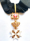 MALTA
THE SOVEREIGN MILITARY ORDER OF MALTA
Donat Cross with Military Trophy, 1st Class. Neck Badge, 116x46 mm, gilt Bronze, both sides enameled, or...