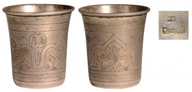 RUSSIA
Silver vodka tumbler 
Straight form, carving by arabesques and fl oral motives, 5.3 cm high, weight 39 g, "84" standard guarantee, Moscow 189...