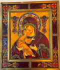 RUSSIA
Polychrome Icon of the Virgin carrying the infant Jesus 
Slave polychrome icon on a metal frame, large rectangular central medallion on the t...