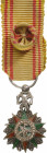 TUNISIA
ORDER OF NICHAN AL IFTIKHAR
Officer's Cross Miniature, 4th Class. Breast Badge, 18x12 mm, Silver with brilliant cut rays, hallmarked, centra...