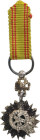 TUNISIA
ORDER OF NICHAN AL IFTIKHAR
Knight's Cross Miniature, 5th Class. Breast Badge, 21x12 mm, Silver with brilliant cut rays, central medallion s...